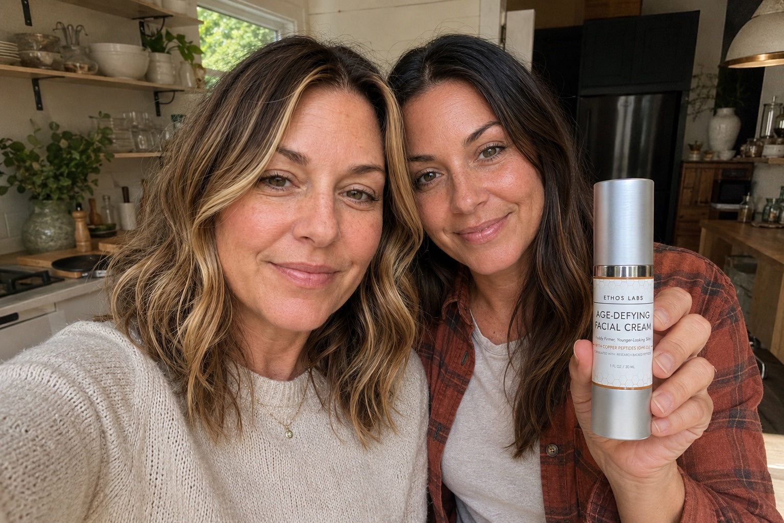 The two sisters who founded Ethos Labs holding the Age-Defying Facial Cream